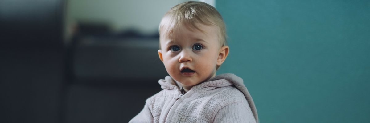 Toddler looks inquisitive and learns | Sparkhouse Blog