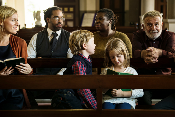 Multigenerational people at a church prepare to worship | Sparkhouse Blog
