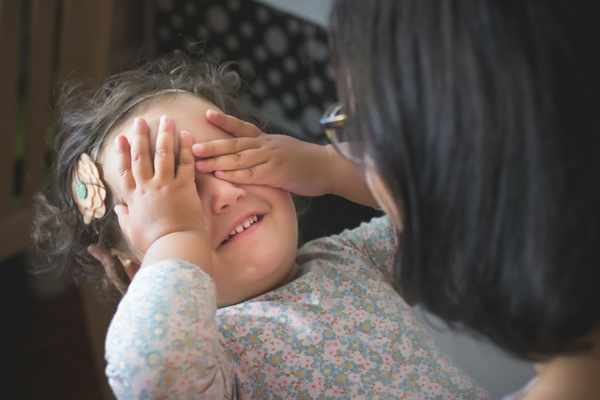 Baby plays peekaboo | Sparkhouse Blog